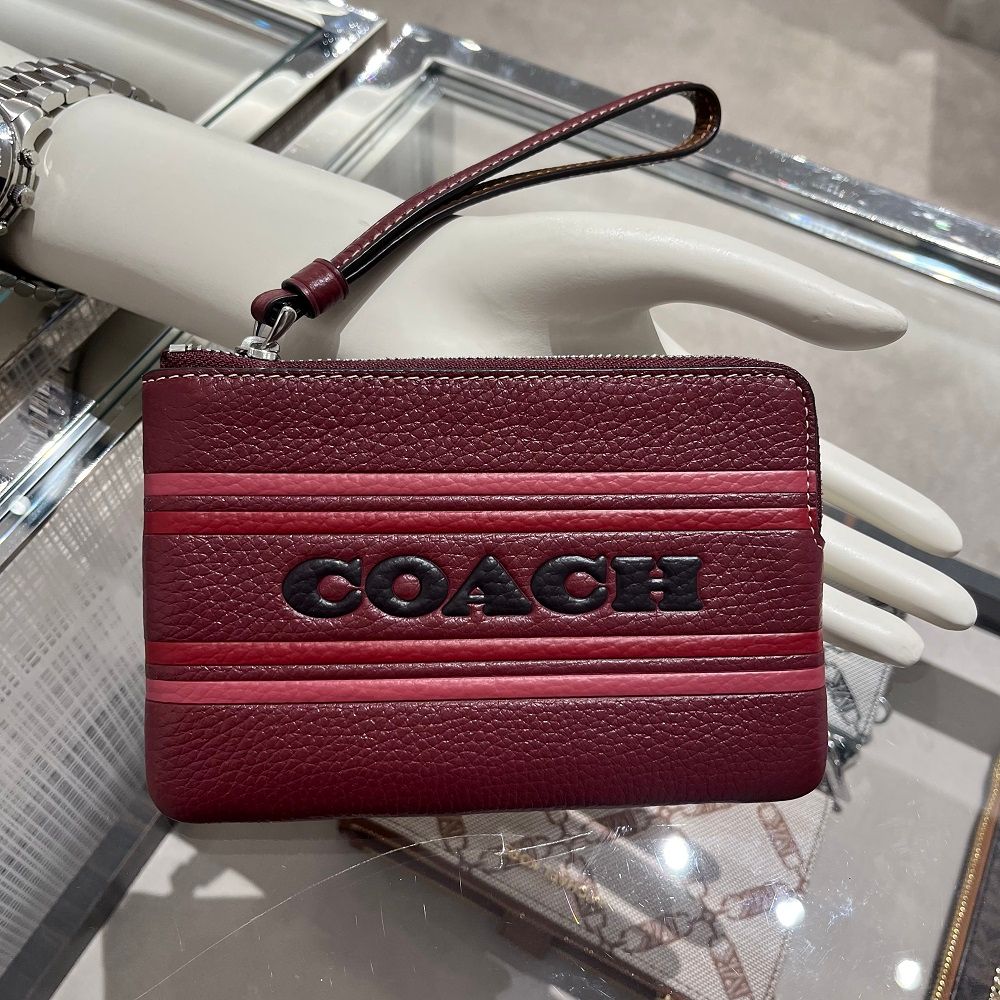 COACH CORNER ZIP WRISTLET IN SIGNATURE CANVAS 58035 IMCBI